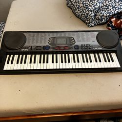 Casio Keyboard with AC Adapter and Stand