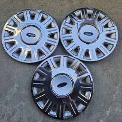 Three 16" Ford Crown Victoria Hubcaps