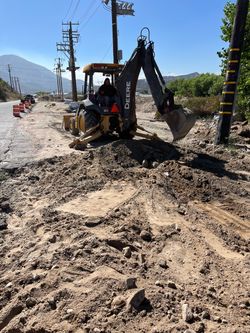 Backhoe jhon deer caterpillar
