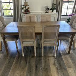 Wooden dining Table set complete with six chairs.