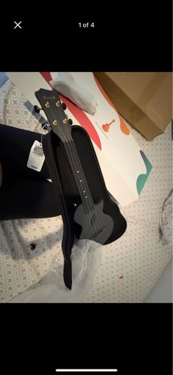 Enya Black Ukulele with Tag