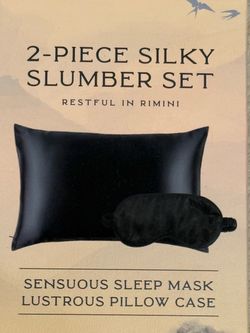 New Bella Ciao 2-Piece Silky Slumber Set Silky black sleep set from Bella Ciao includes one sleep mask and one pillowcase. The material is a lustrou