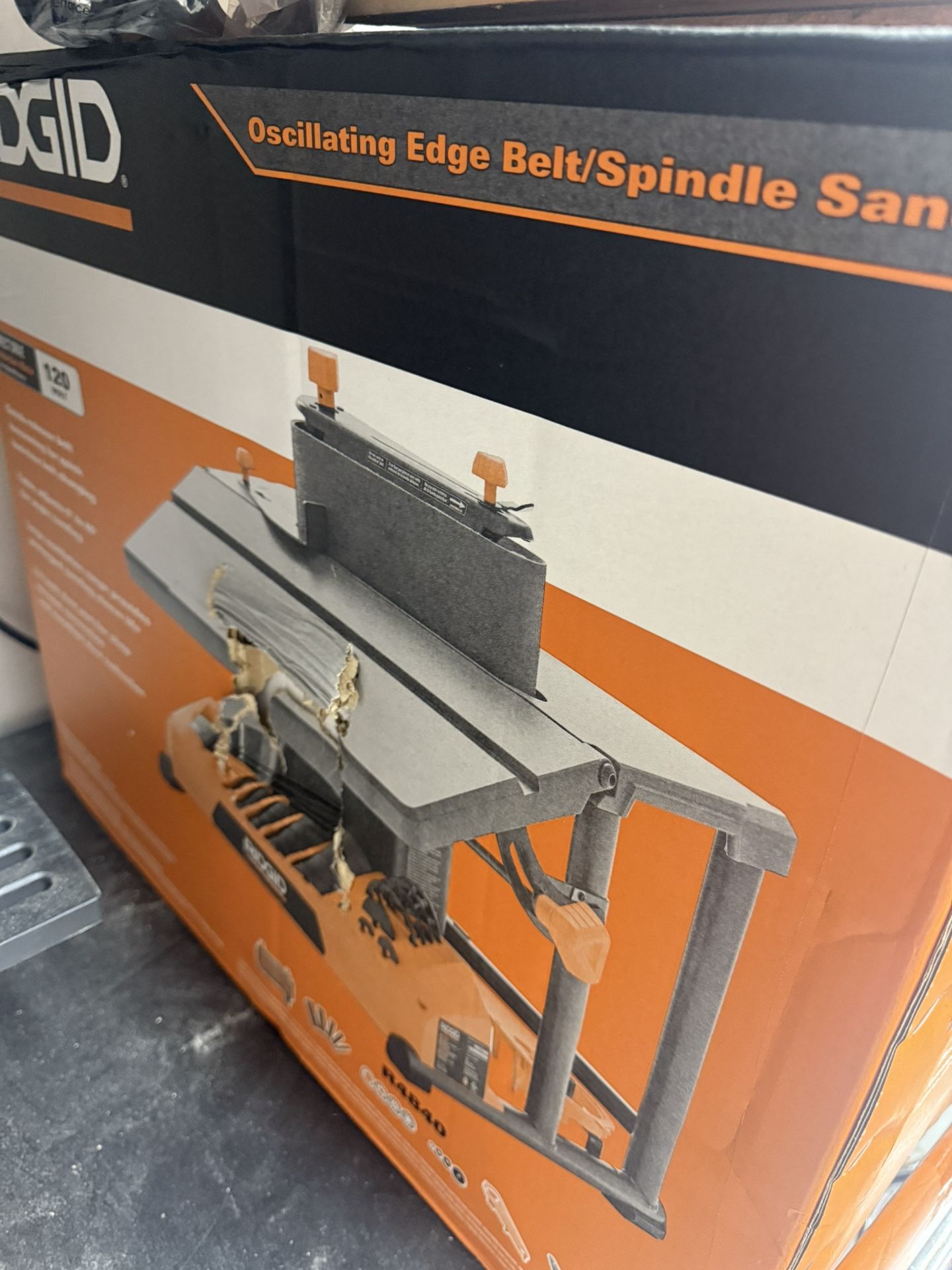 Rigid oscillating belt and spindle sander