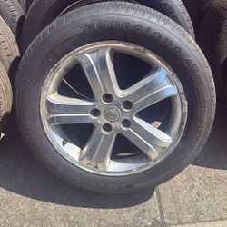 4 235/55/19 On Aluminum Rims