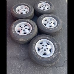 4 X 235/75r15 5x4.5 5x114.3 Jeep Rio Grande YJ Wheel Rims With Good Tires!