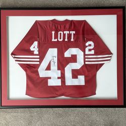 San Francisco 49ers Ronnie Lott Autographed Framed Red Wilson Jersey With COA