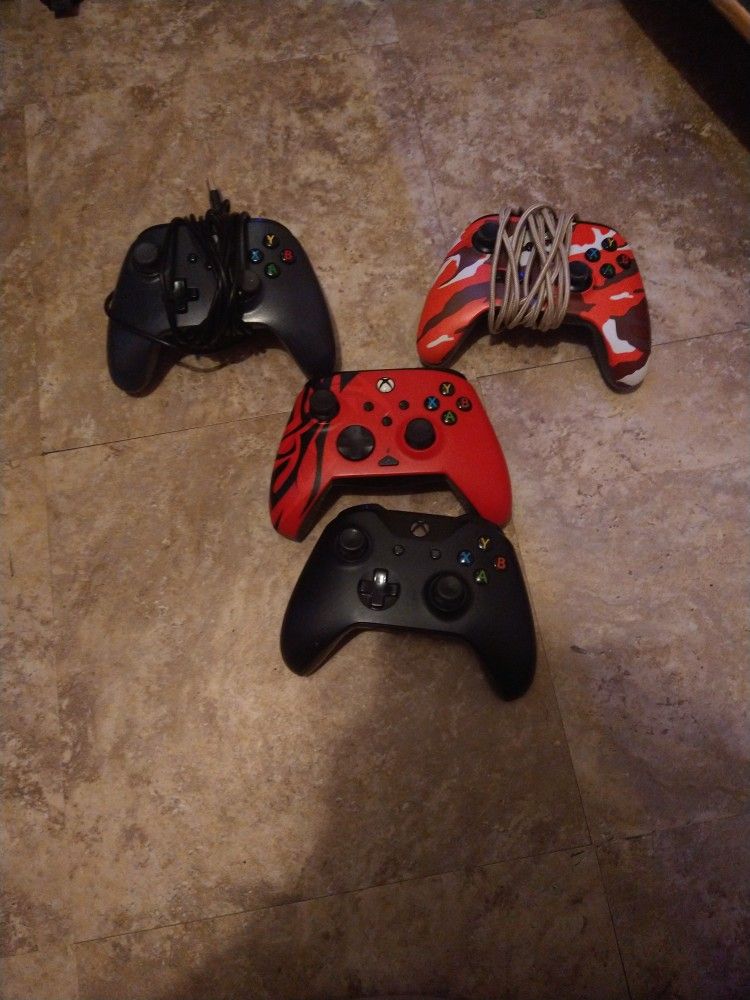 4 Xbox One Controllers 3 Wired 1 Wireless 2 Red 1 Black 1 Grey