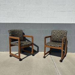 Pair of Vintage Leaf Upholstery and Wood Rolling Chairs