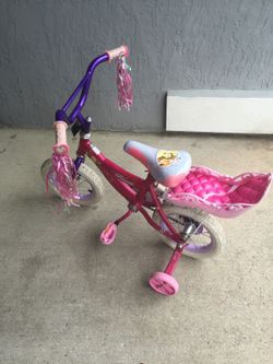 Huffy princess bike with trading wheels