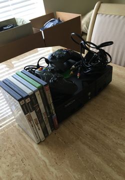 Xbox 360 very good condition with two controls and 6games $100.00 plus $25 for the games and $20.00for the controls