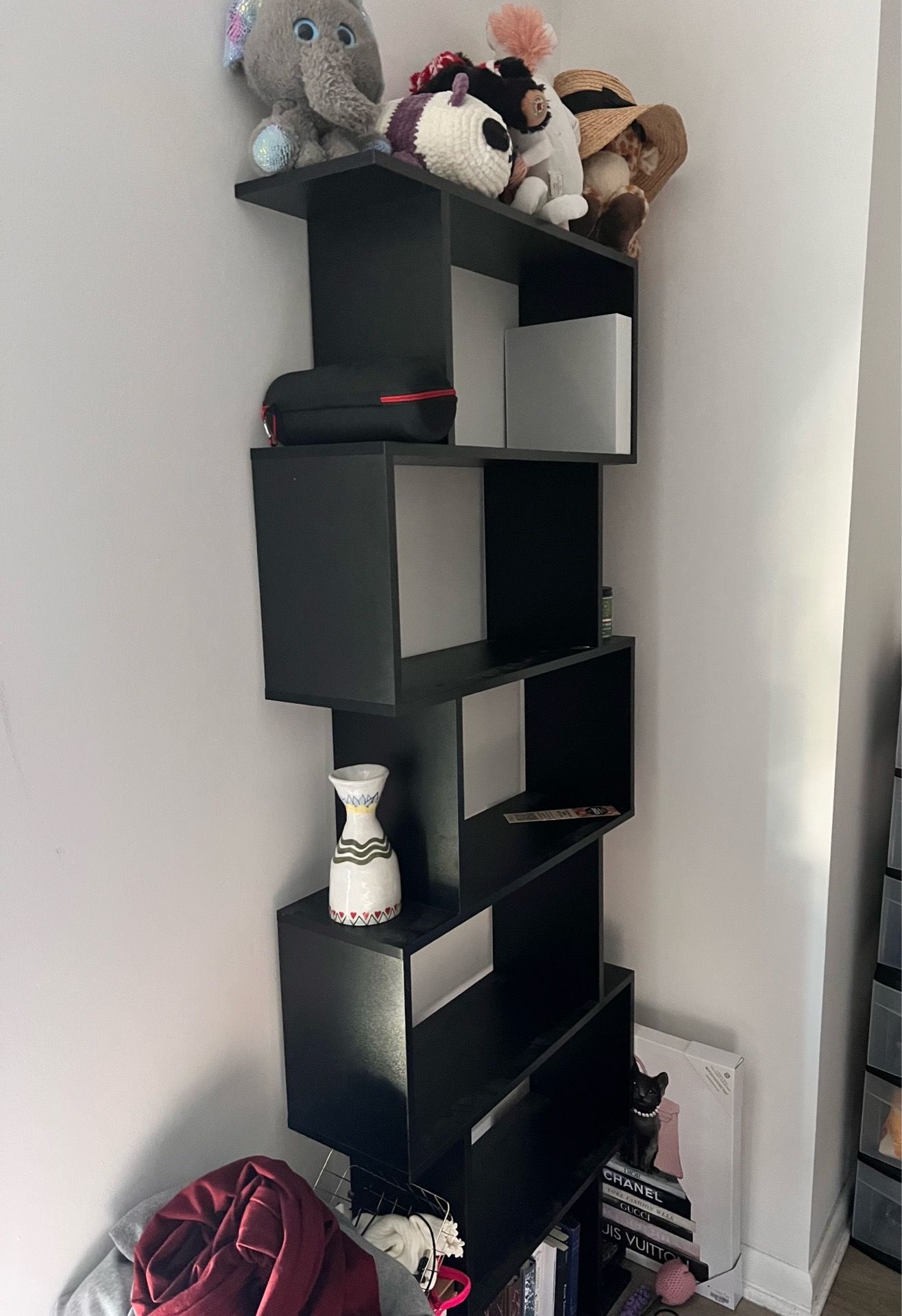 Two black bookshelves