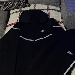 black reflective nike tech suit