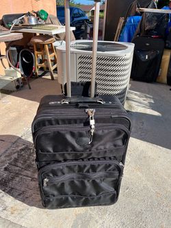 Suitcase in good condition; all zippers work very well. Includes a padlock and 3 keys. Measures 25 inches high, 17 inches long, and 10 inches wide.