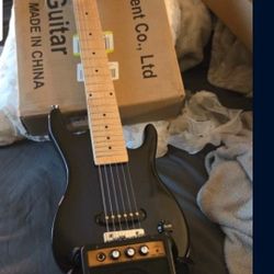 Travel Size Electric Guitar w/ Amp Tuner Strings Etc