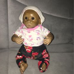 This Is a 3 Month Old Monkey It Has a Little Bit If Hair On It’s Body And It Has A Soft Body. 