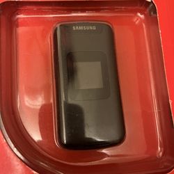 Mobile :A Birfin Mobile payLo prepaid mobile service plan featuring a Samsung Entro flip phone