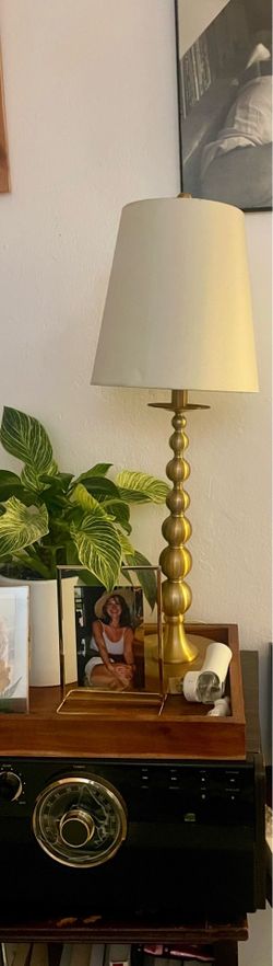 2 gold stem lamps