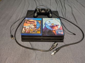PS4 Pro with Controller and 2 Games