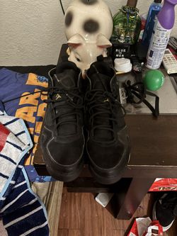 Jordan Flight Club 91 'Black Metallic Gold' sneakers. 