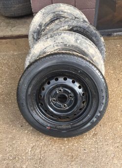 A set of four. Used. Like new. 165 7014 tires.