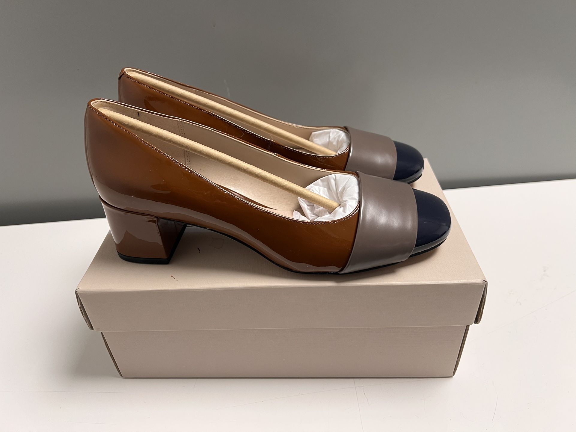 Brown and navy leather Clarks heels