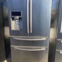 Samsung four door stainless steel fridge works perfect in good condition. Free delivery to your garage 45 day warranty.