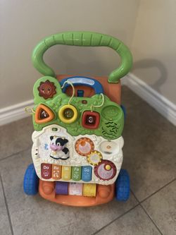 V Tech Sit To Stand Learning Walker 