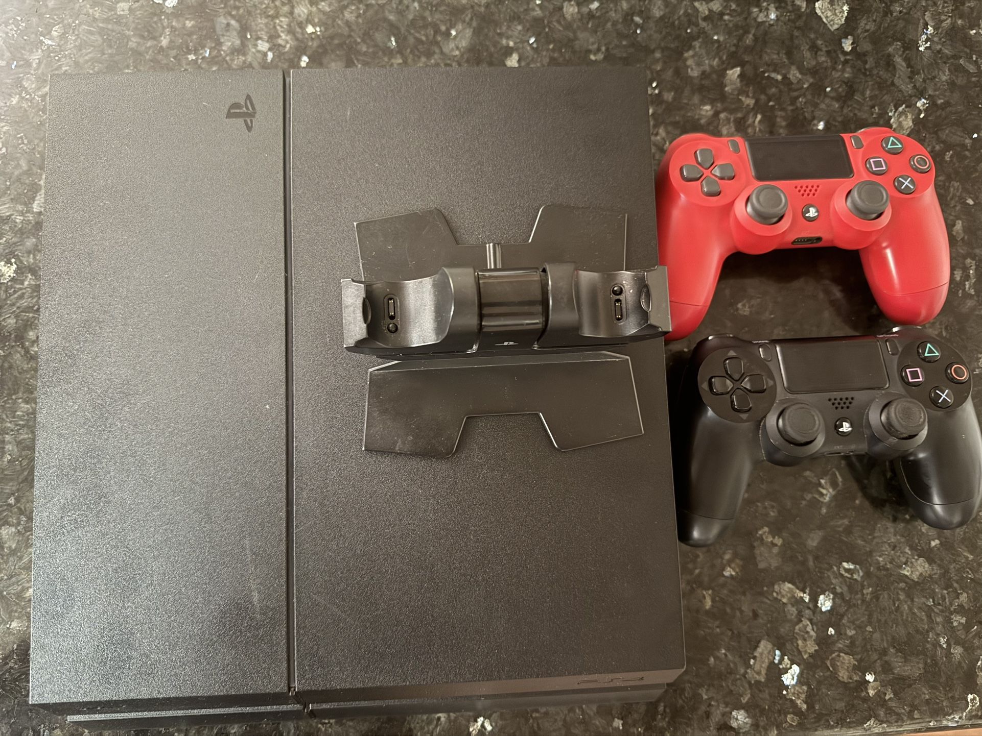 500 GB PS4 with 2 controllers & Sony charging dock