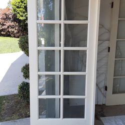 Solid Wood Double Paned Door With Weather Stripping. 