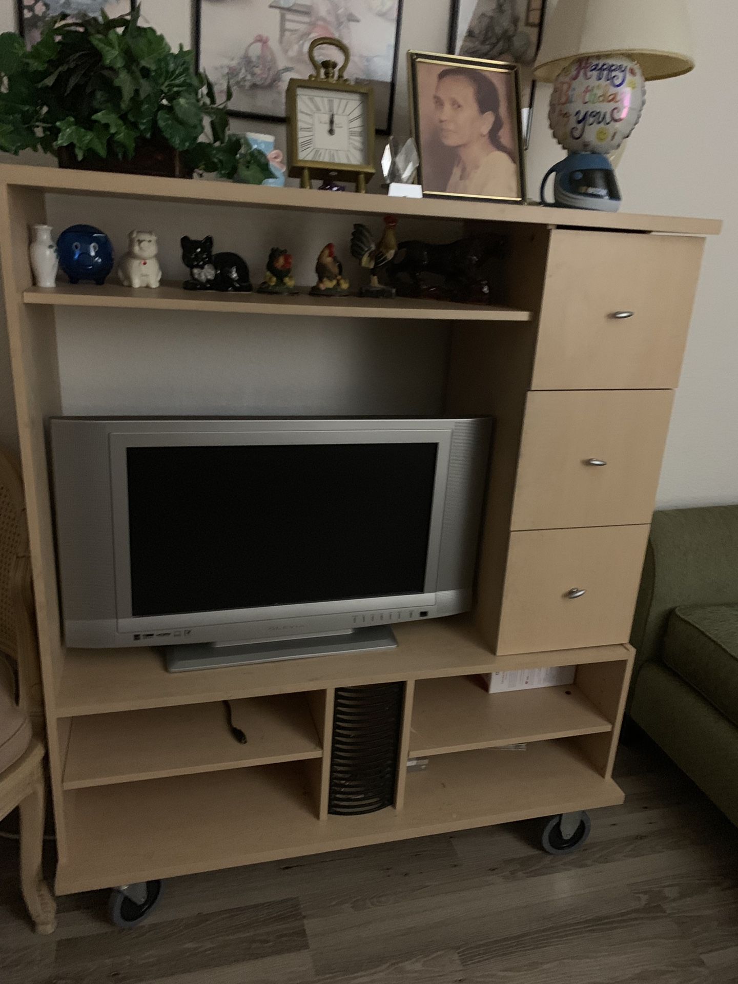 Tv stand with wheels and tv