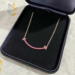 Tillany & Co. Tiffany T Smile Pendant Necklace Pink