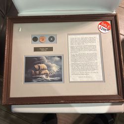 Frame of history with vintage coins