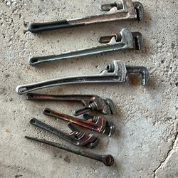 Big And Small Pipe Wrenches Aluminum And Carbon