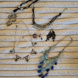 8 Pieces of Costume jewelry. Earrings necklaces anklet and a beautiful ring.