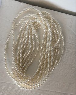 11 Pearl Necklaces