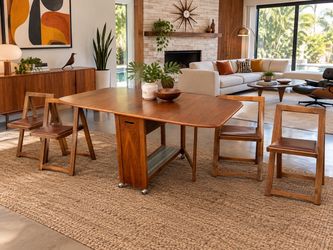 Mid Century Danish Teak Dropleaf Storage Table and Chairs Great Condition Table wings up 63x34x29.5in Wings down 14x34x29.5in Chairs 19x18x29 seat hei