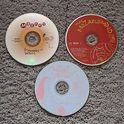 Assortment of children's Mozart classical music CDs