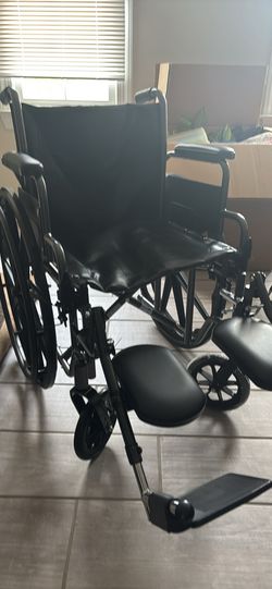BRAND NEW WHEEL CHAIR!