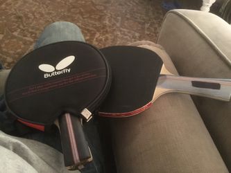 Two butterfly rackets with case.
