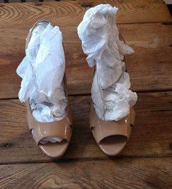 Pair of Audrey Brooke nude leather women's high heels size 8