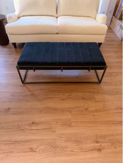 Black velvet ottoman