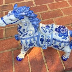 Blue and white glass horses