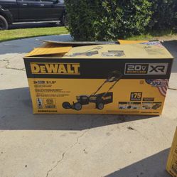 Brand new DEWALT 20V MAX Lawn Mower: cordless, rear-wheel drive, push type. Batteries and charger not included.