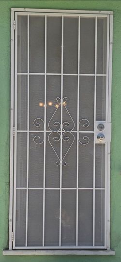White Metal Security Screen Door with Scrollwork