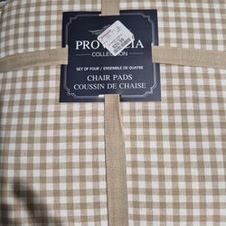 Set Of four chair pads and extra  Two More.      