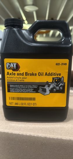 Axle and brake oil additive for backhoe