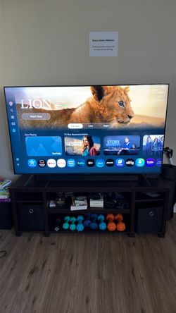 Samsung 65” Smart TV w/ remote and TV Stand