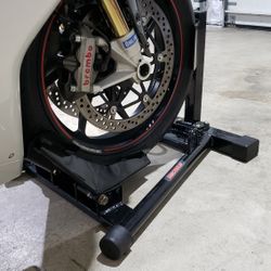 Like New: Motorcycle Roll On Wheel Chock/Stand