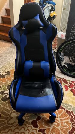 Gaming chair with helmet