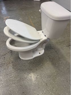 Used toilet with soft close